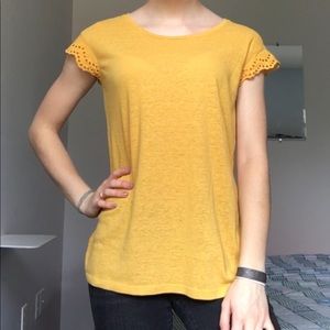 Yellow shirt with cutout sleeves